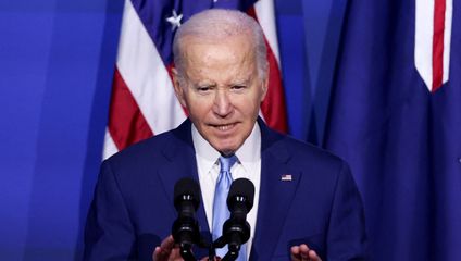 Biden signs spending bill, narrowly staving off government shutdown